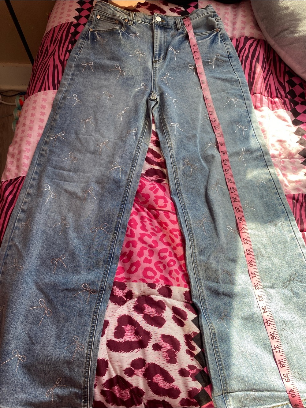 Rhinestoned bow wide leg jeans